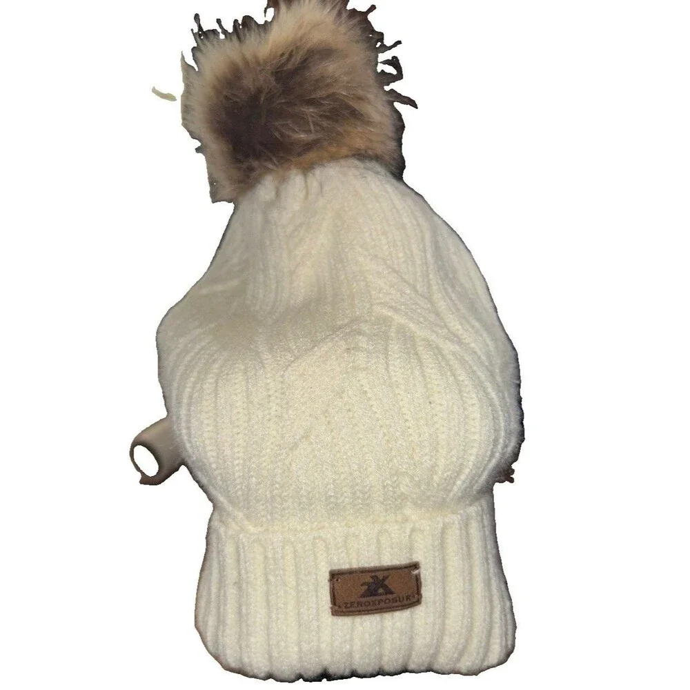 ZeroXposur women's cream knit beanies with a faux fur pom-pom